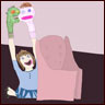 A girl puts on a puppet show from behind a soft looking chair
